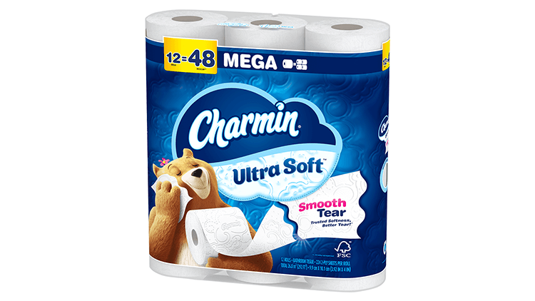 A blue package of toilet paper features an animated bear holding a roll of toilet paper in one hand and a square of toilet paper in the other to her face. Blue and white text provides additional product information.
