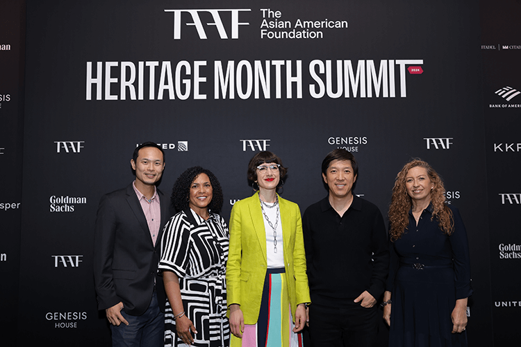 Five panelists from the 2024 AAFHM Summit, including P&G's Lela Coffey, smile together in front of a black backdrop with Heritage Month Summit branding.