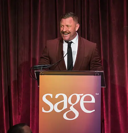 Brent Miller accepting the SAGE Award