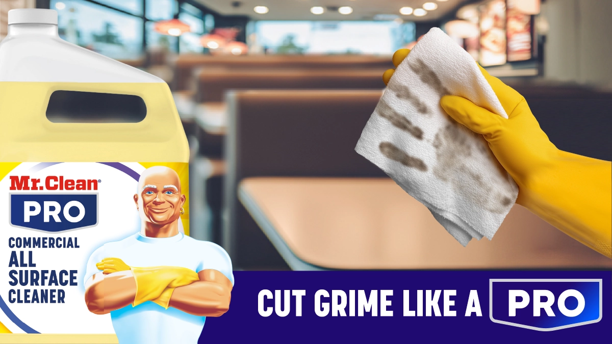 A large bottle of commercial all-surface cleaner with Mr. Clean's image. A gloved hand holds a dirty white cloth, signifying strong cleaning power in a restaurant setting.