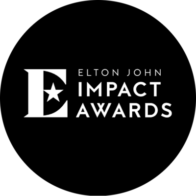 A black and white text logo that says Elton John Impact Awards.