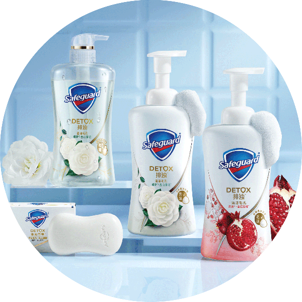Packages of Safeguard Detox Body Wash in various scents, against a white tiled background