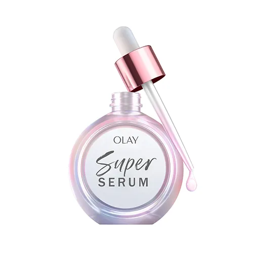 A round pink and pearlescent colored bottle. A dropper hangs on top of the bottle.