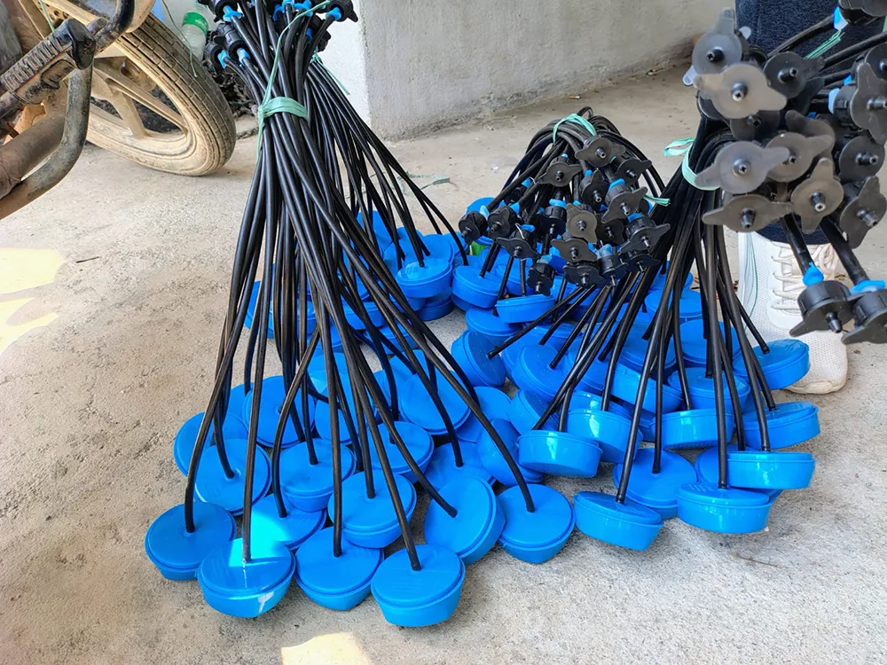 A bundle of irrigation technology with black wires and blue sensors.