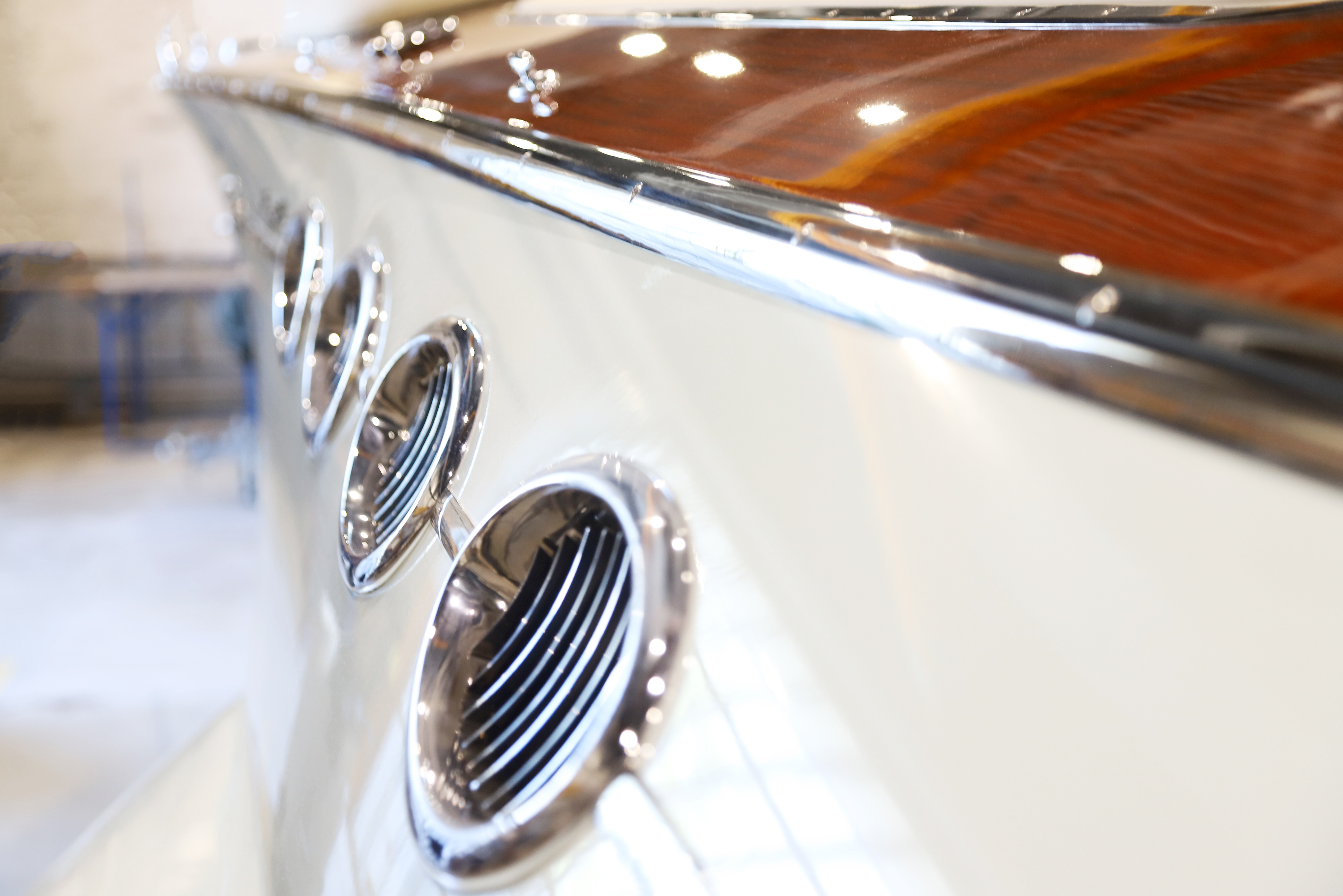 Hand-polished stainless vents along the hull, accentuating the Torpedo's signature tumblehome.