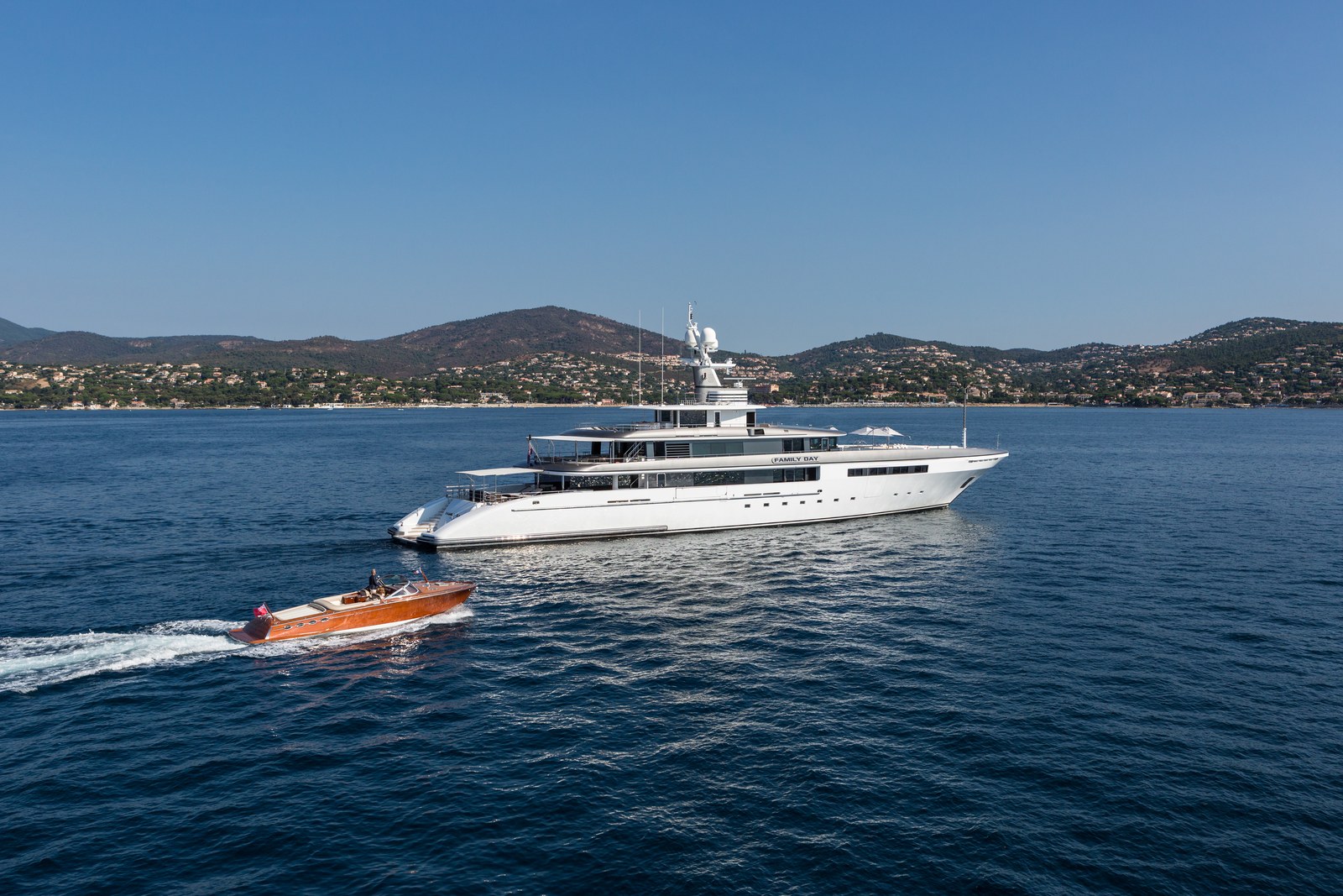 J Craft Torpedo running alongside a superyacht at anchor.