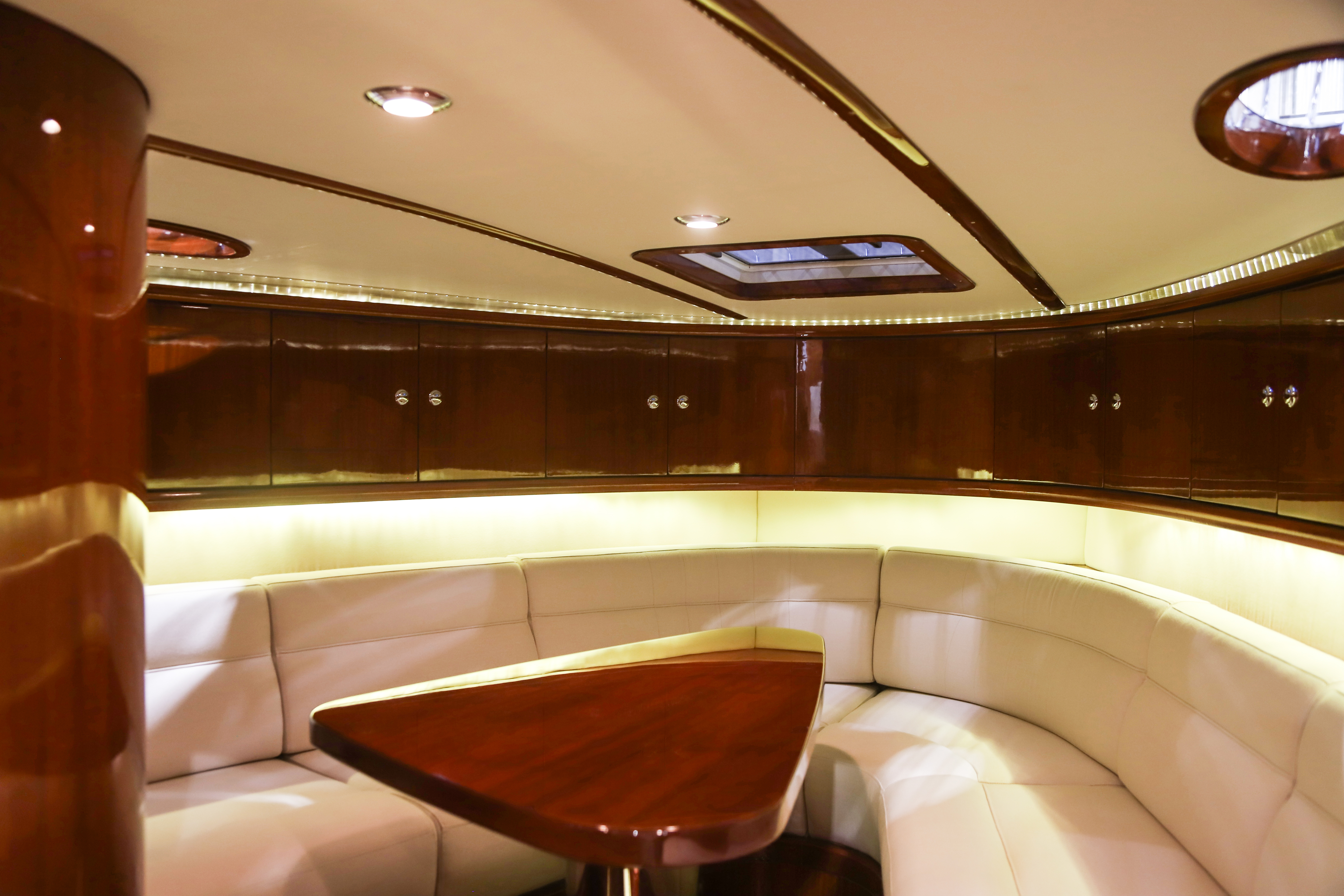 Front cabin: hand-stitched LVMH upholstery against high-gloss mahogany, hand-made and finished.