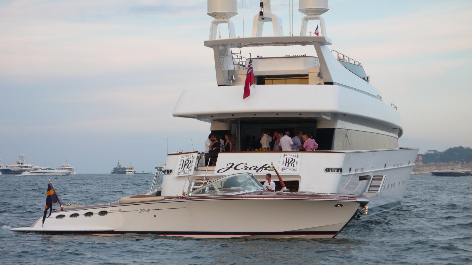 J Craft Torpedo alongside a yacht stern during a guest transfer.