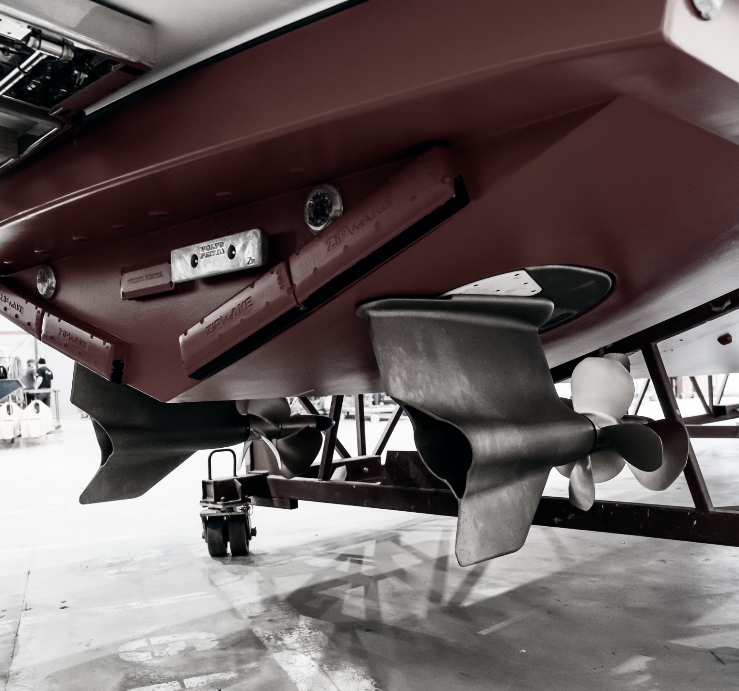 Volvo Penta IPS drives with counter-rotating propellers and Zipwake interceptors on the J Craft Torpedo hull underside