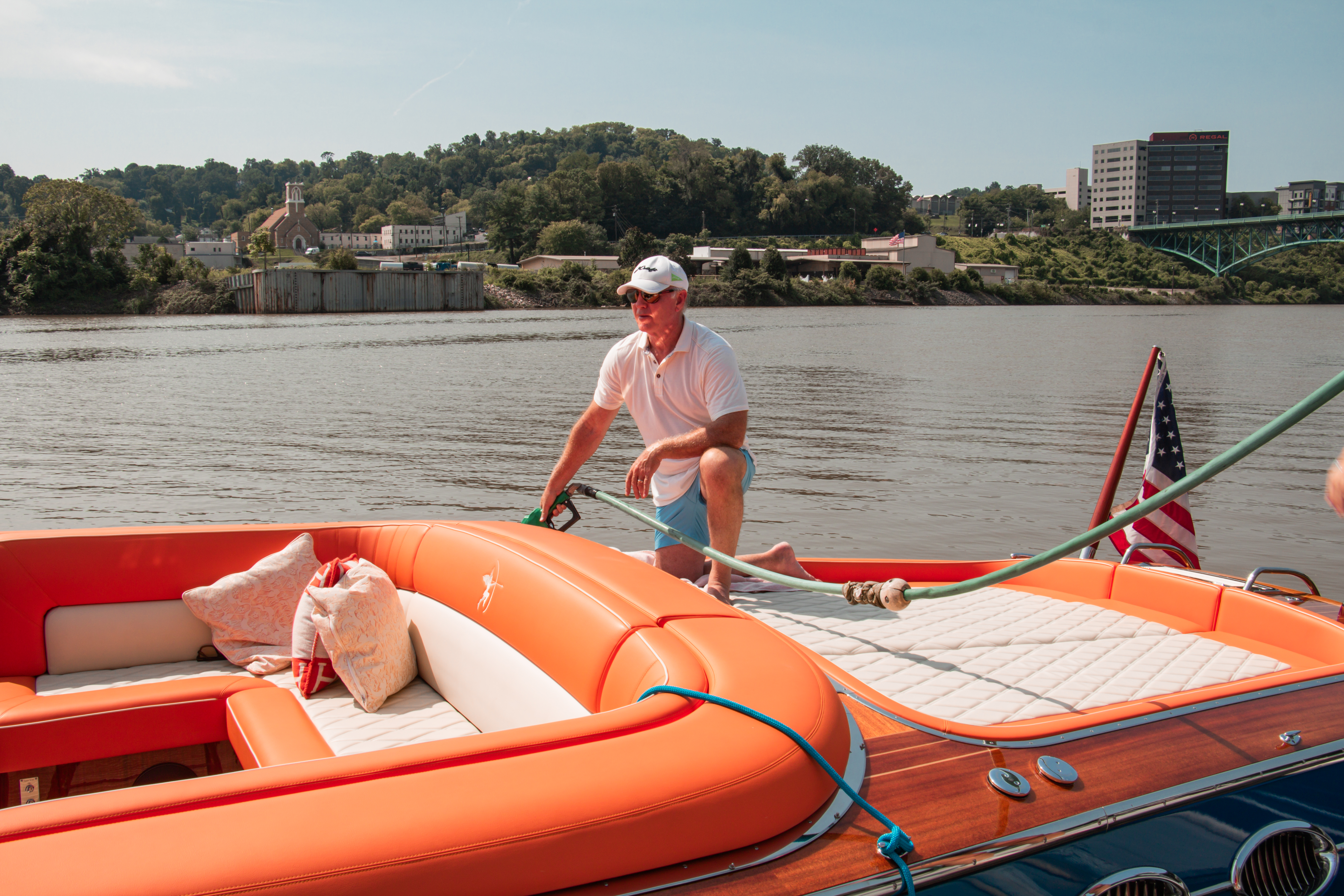 Fred Coyle refuels Amazon Queen during a day on the water in Tennessee.