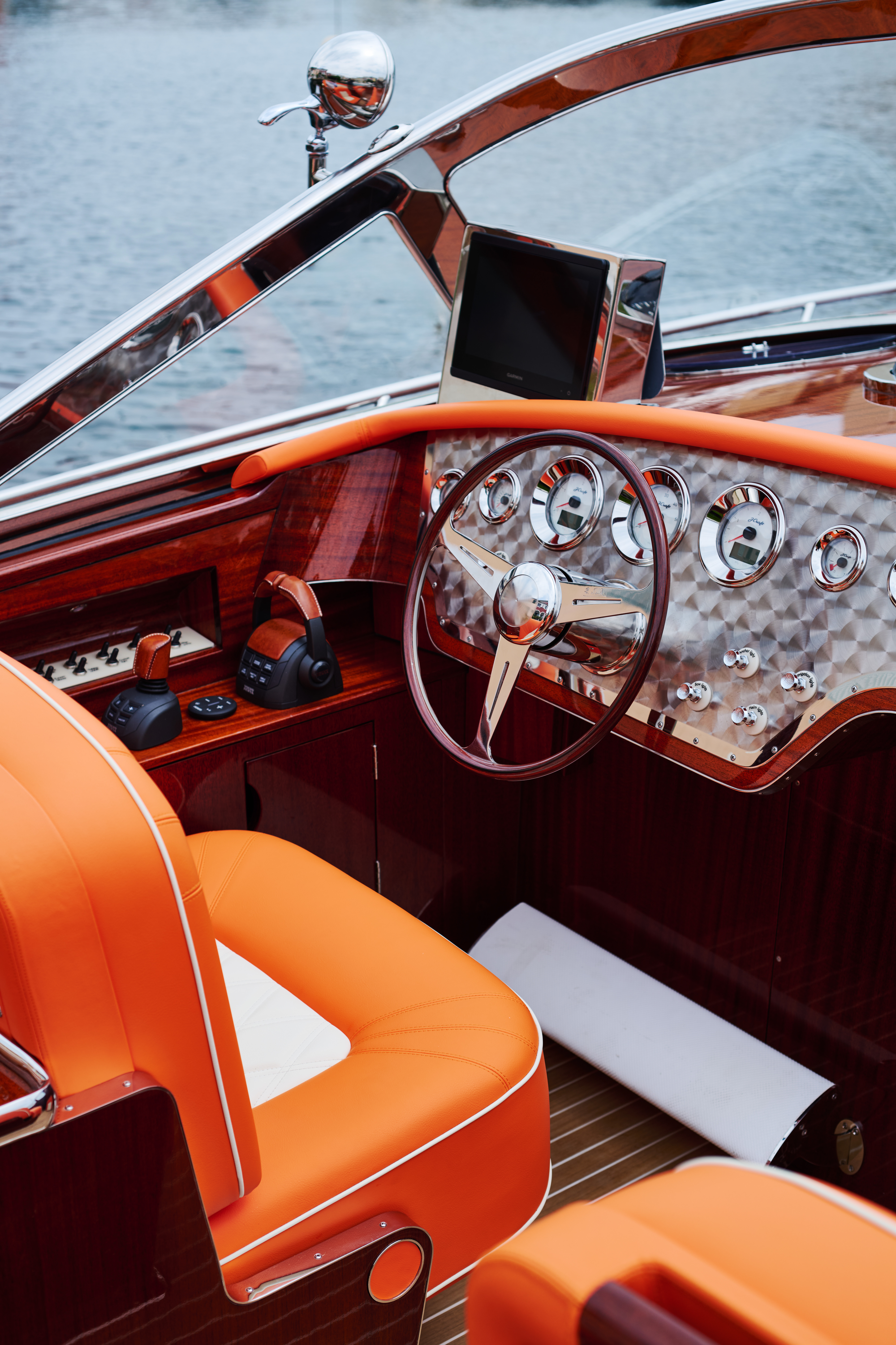 Amazon Queen's helm combines polished mahogany, analogue instruments and an integrated navigation display.