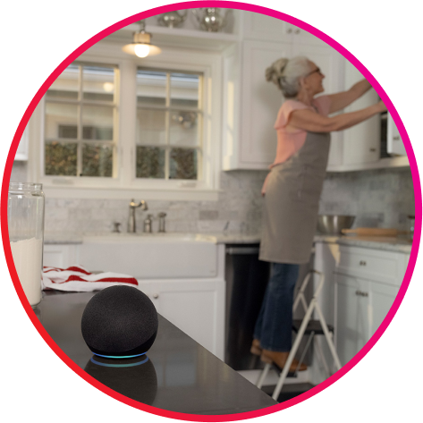 Woman on stepping stool in kitchen