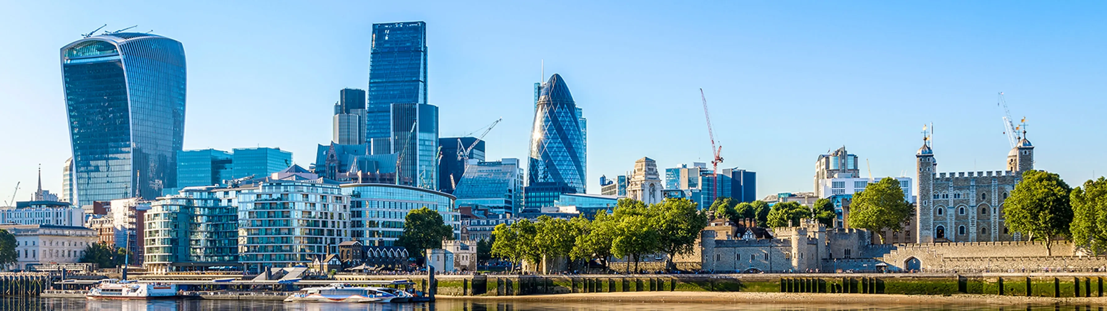 A shot of the London skyline over the Thames from Tower Hill.