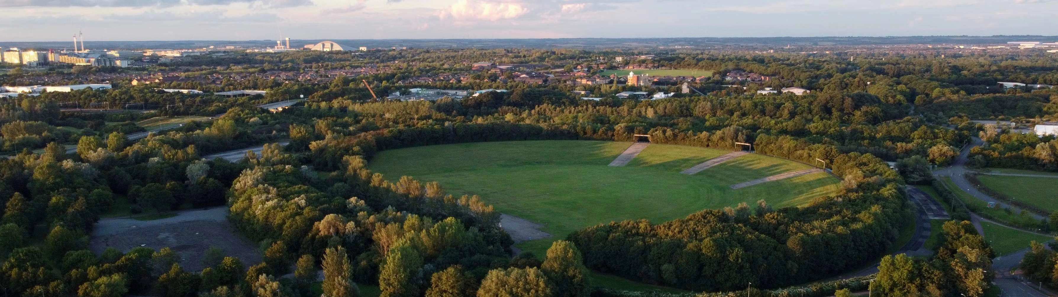 An aerial photo of the green, modern city of Milton Keynes on a clear day.