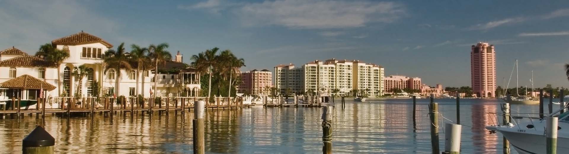 Dark waters reflect the hotels lined in the background in Boca Raton. 