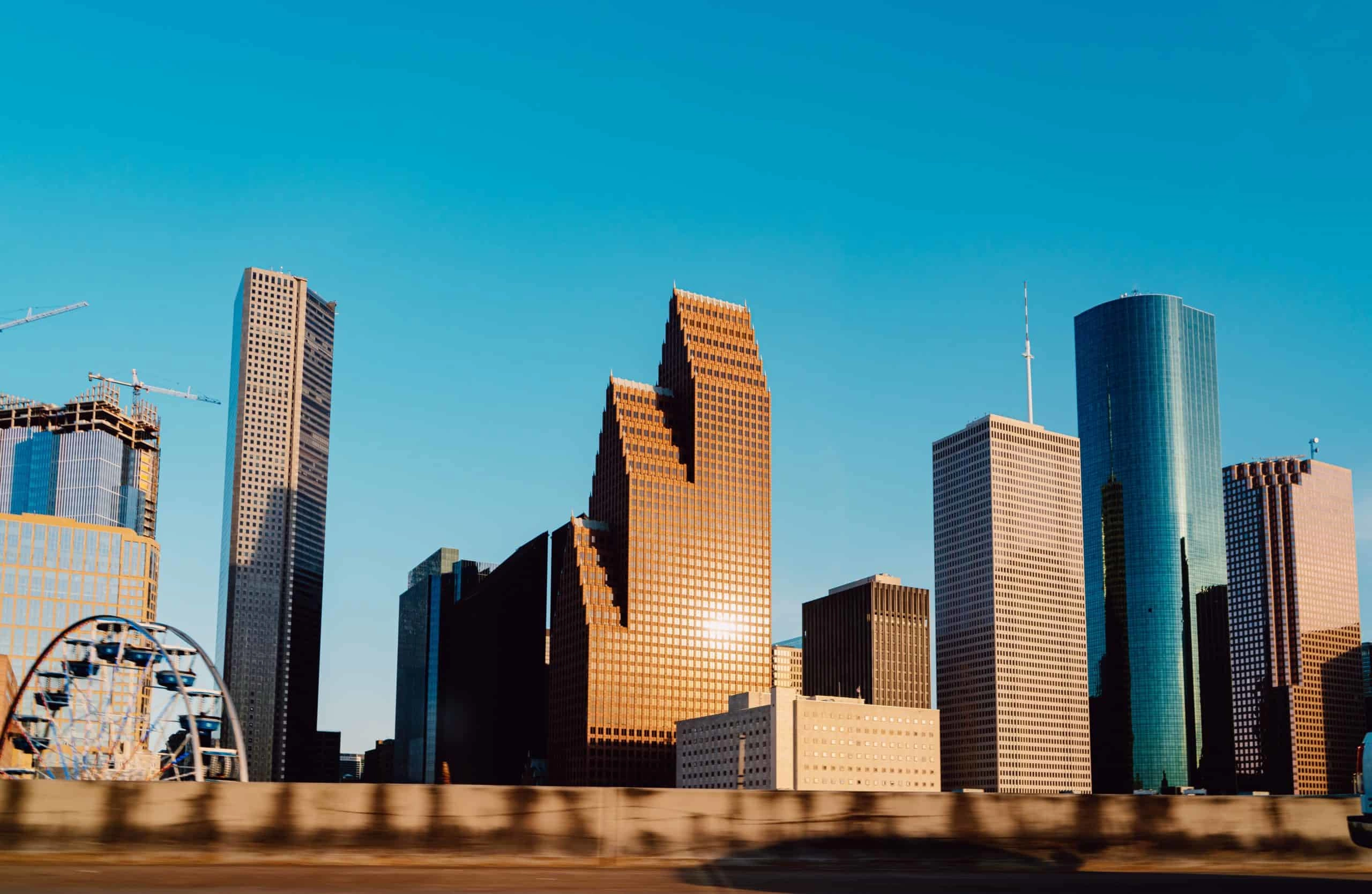 <figcaption class="wp-element-caption">Houston skyline. <em>Image credit: Adrian N/Unsplash</em><br></figcaption>