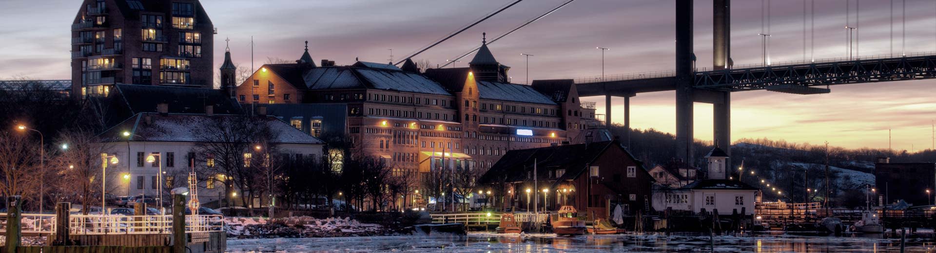 Historic buildings along the banks of Gothenburg at night
