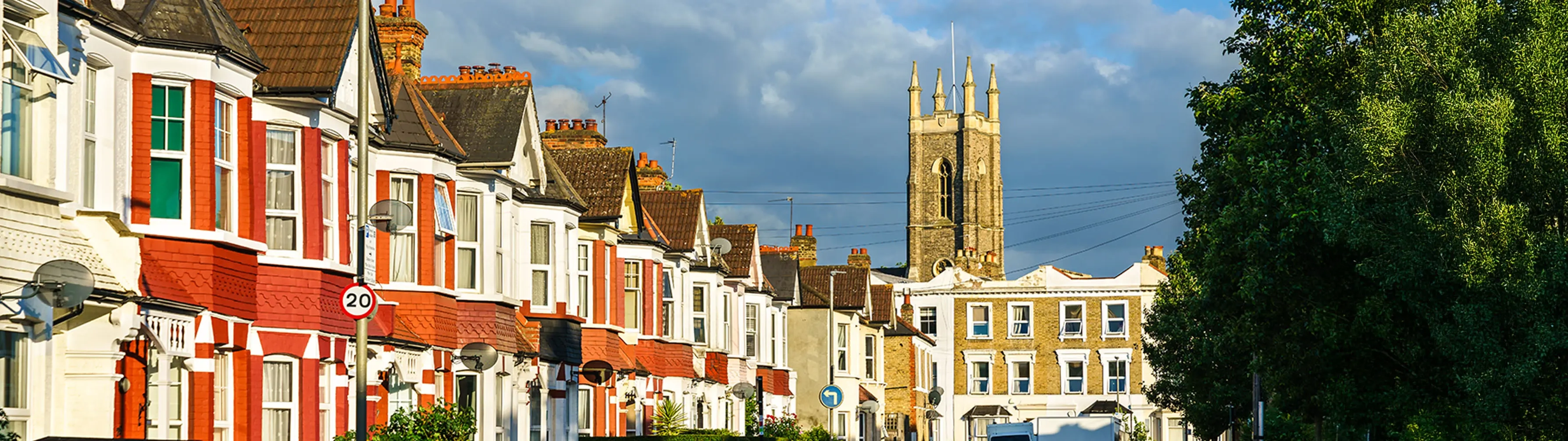 A colourful street of terraced houses in London Tooting.