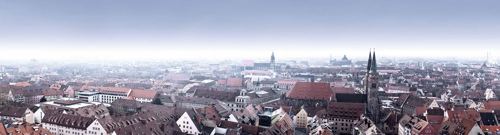 The red roofs and church steepls of historic Nuremberg.