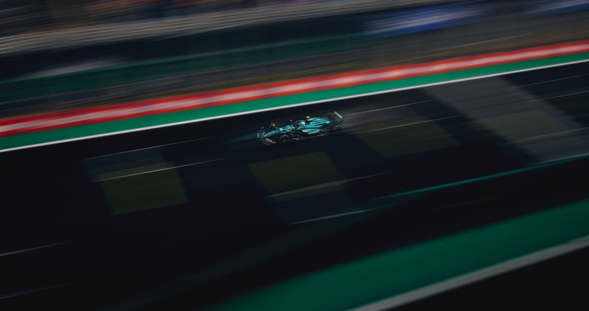 Action shot of an Aston Martin taking part in the Las Vegas Grand Prix race with speed blur effect.