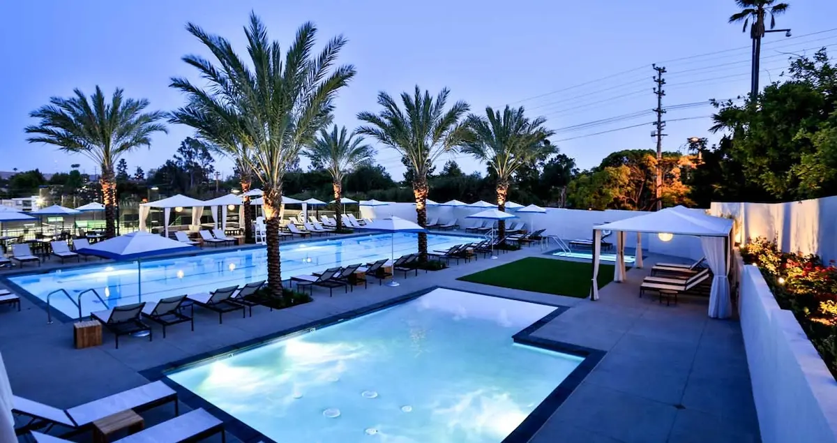 Shot of the swimming pools at the Griffin Club private members' club in Los Angeles at dusk.