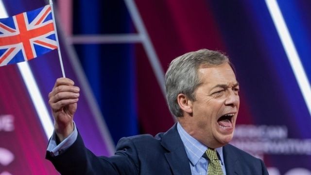 Nigel Farage waving the Great Britain flag. Image credit: Erik S. Lesser/EPA/EFE.