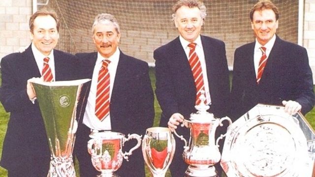 The Liverpool champs with their trophies. Image credit: LFC.