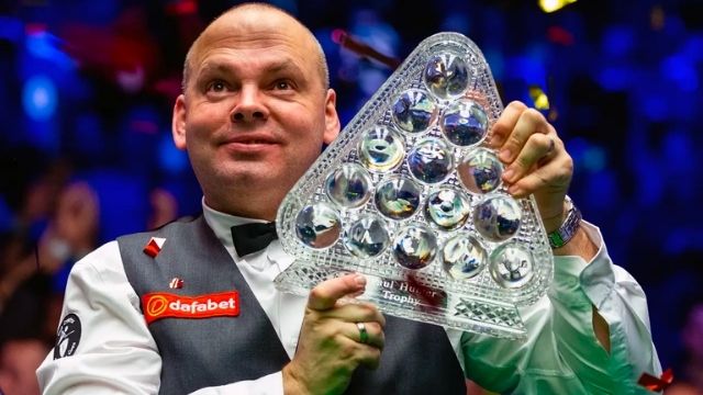 Bingham regains his winning title at the Snooker Masters 2020. Image credit: Steven Paston/PA.