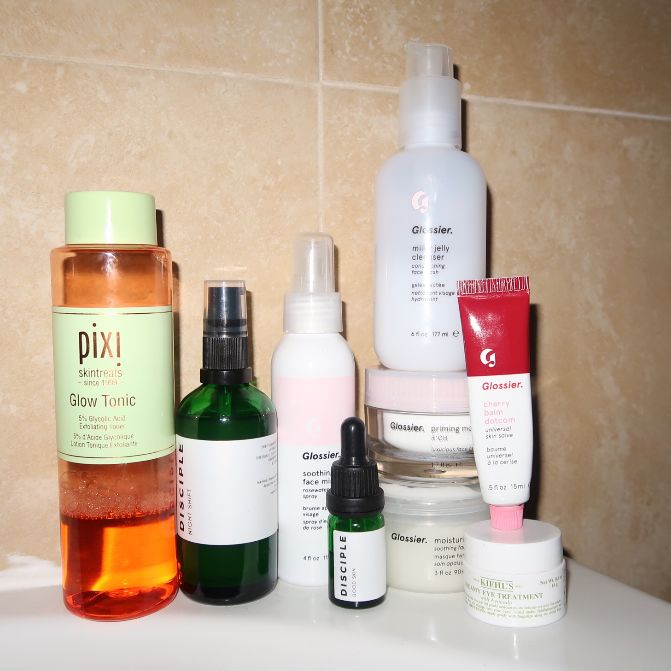 Milky Jelly Cleanser, Soothing Face Mist, Balm Dotcom in Cherry, Priming Moisturizer in Rich, and Moisturizing Moon Mask with other skin care products.