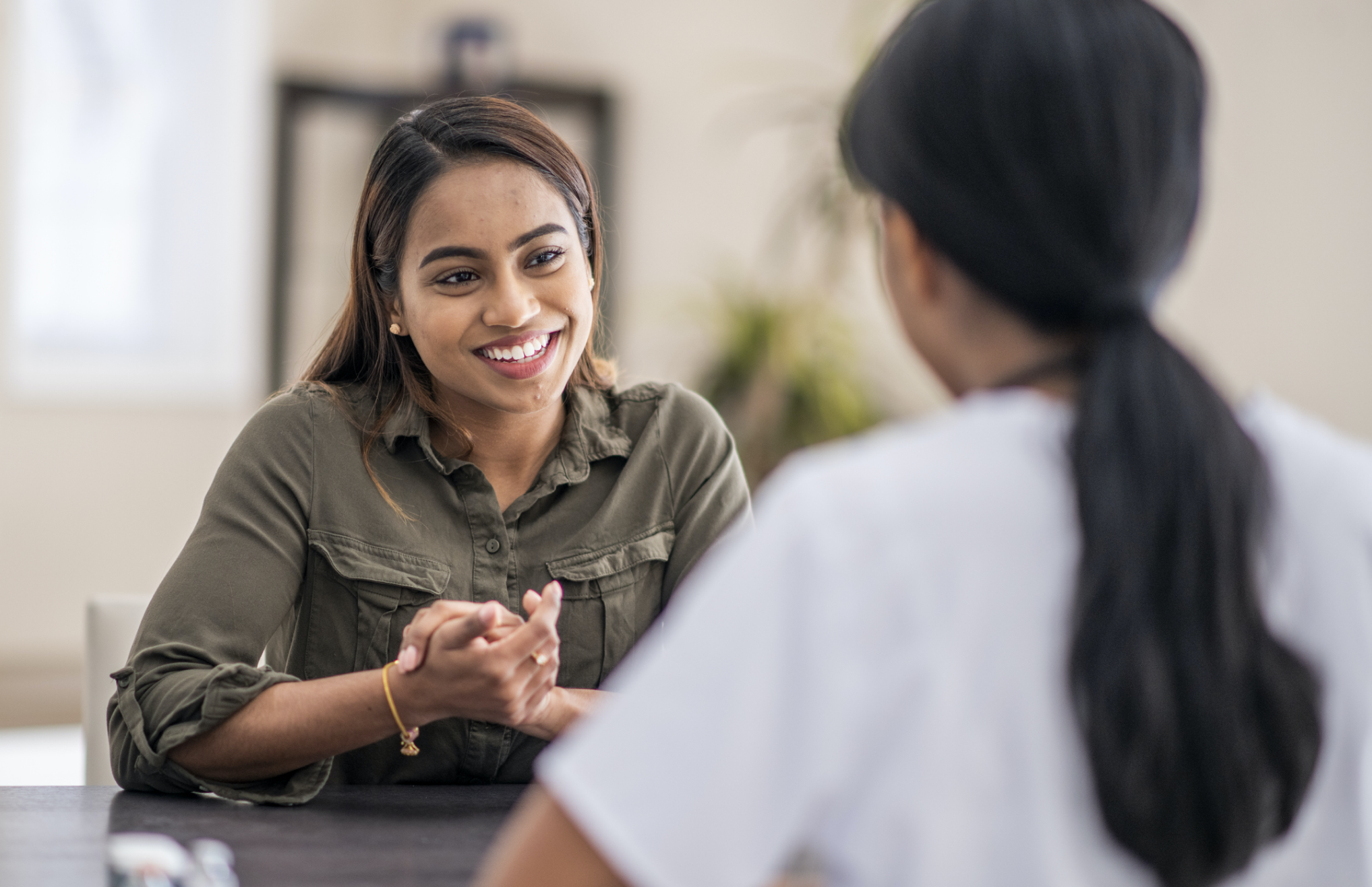 Woman speaking to doctor