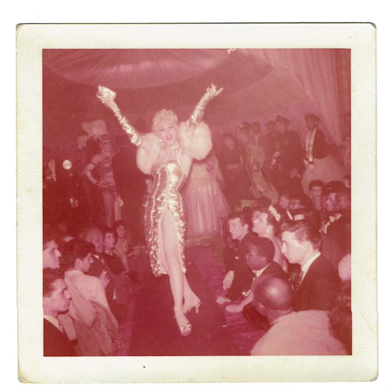 Michael "Daphne" Alogna at Phil Black’s drag ball, Harlem, c. 1955