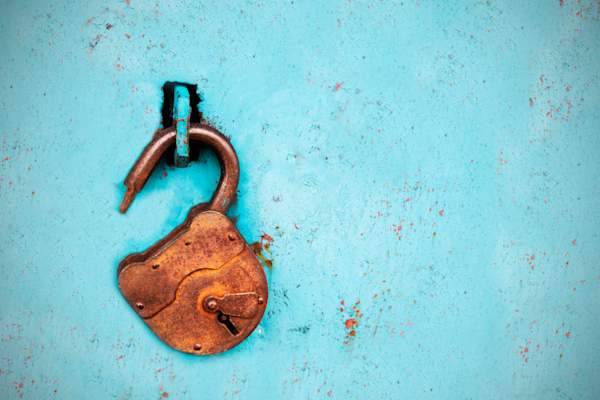 open padlock on blue background