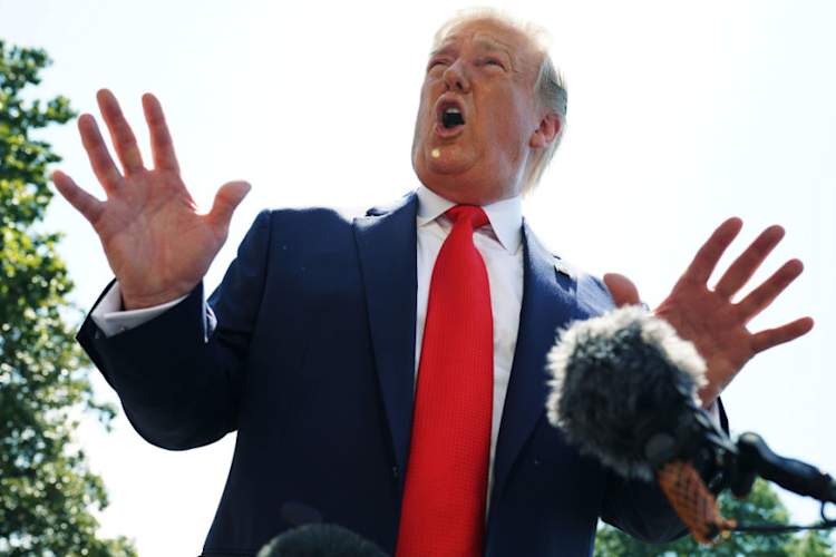 U.S. President Donald Trump speaks to members of the media prior to his departure from the White House July 5, 2019 in Washington, DC.
