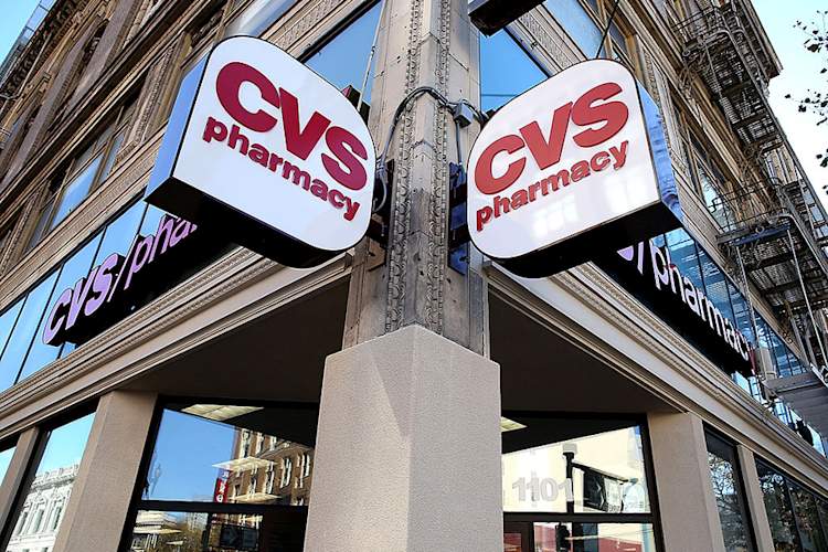 Dual CVS Pharmacy signs outside of CVS Store