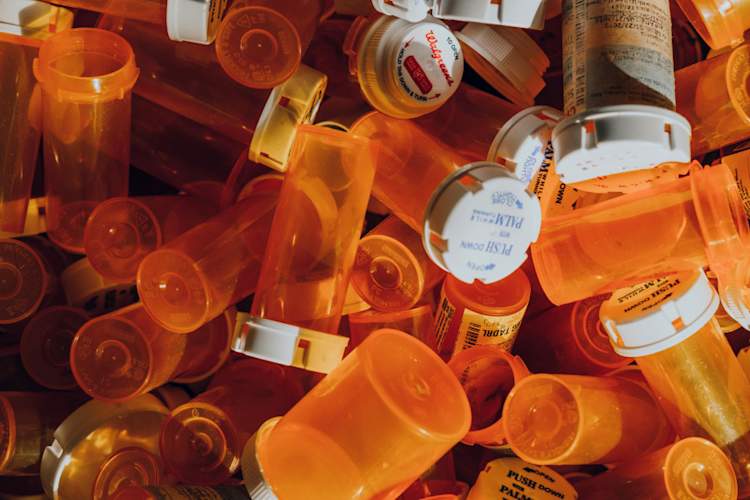 pile of prescription pill bottles