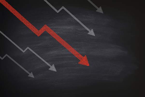 Downward arrows on blackboard
