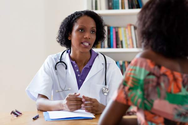 Black woman with doctor