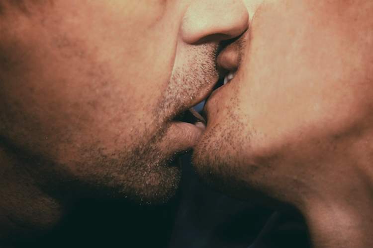 two men kissing