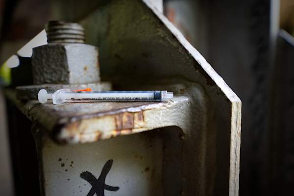 Used heroin syringe