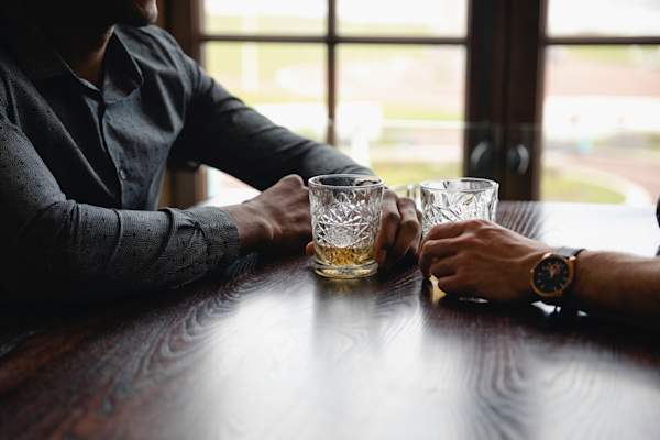 men having whiskey