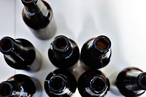 Open beer bottles, overhead view