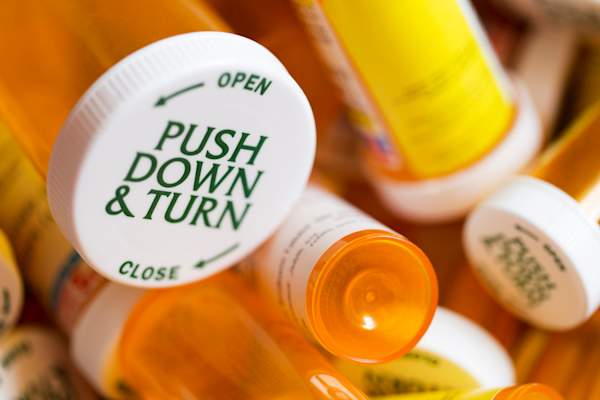 prescription pill bottles-iStock-1140455513