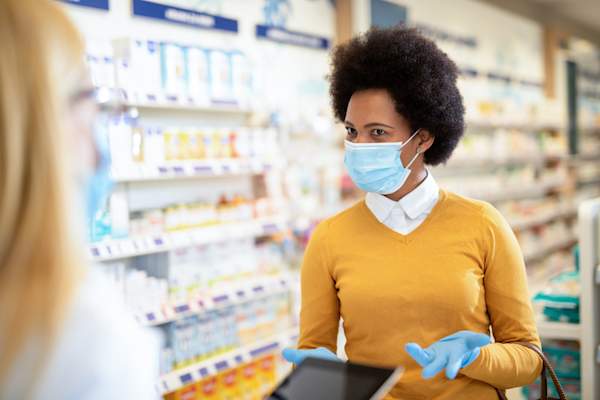 Black woman at pharmacy