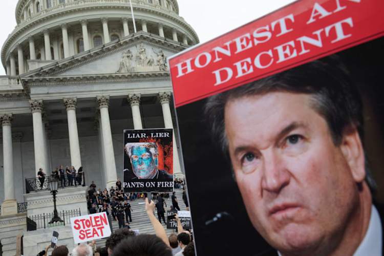 Protestors occupy the steps on the East Front of the U.S. Capitol in protest of Supreme Court nominee Judge Brett Kavanaugh, October 6, 2018 in Washington, DC.