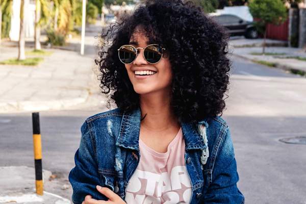 happy woman wearing sunglasses