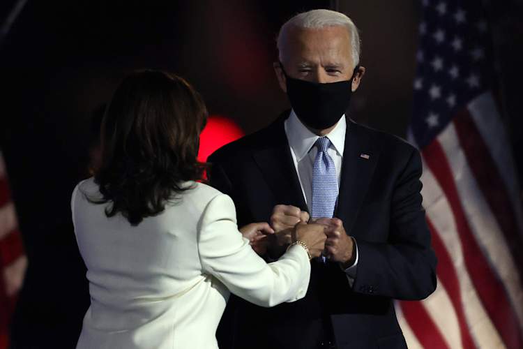 President-elect Joe Biden And Vice President-elect Kamala Harris fist bump after election win