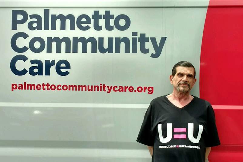 Michael Luciano in front of Palmetto Community Care van
