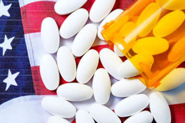 U.S. flag and pills