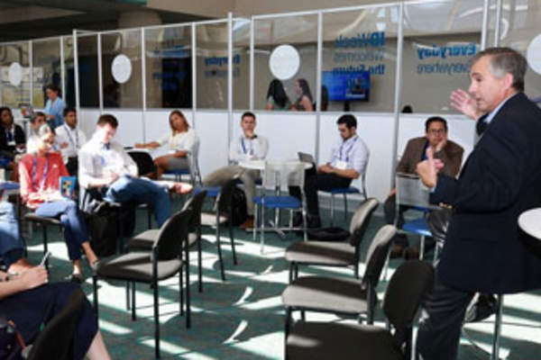 IDWeek 2017 attendees listen to a medical education talk in the ID 356 Lounge (Credit: Infectious Diseases Society of America)