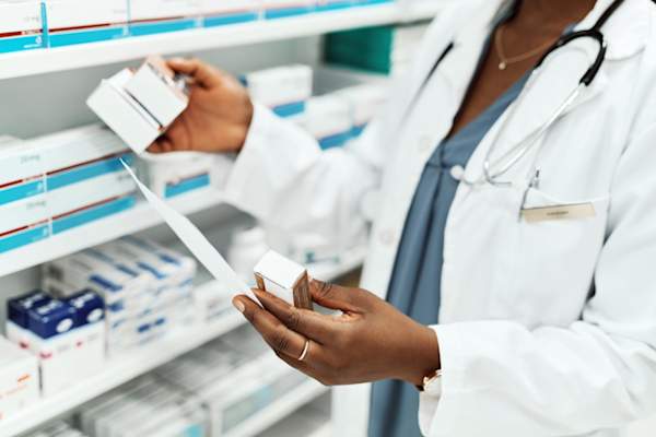 pharmacist preparing prescription